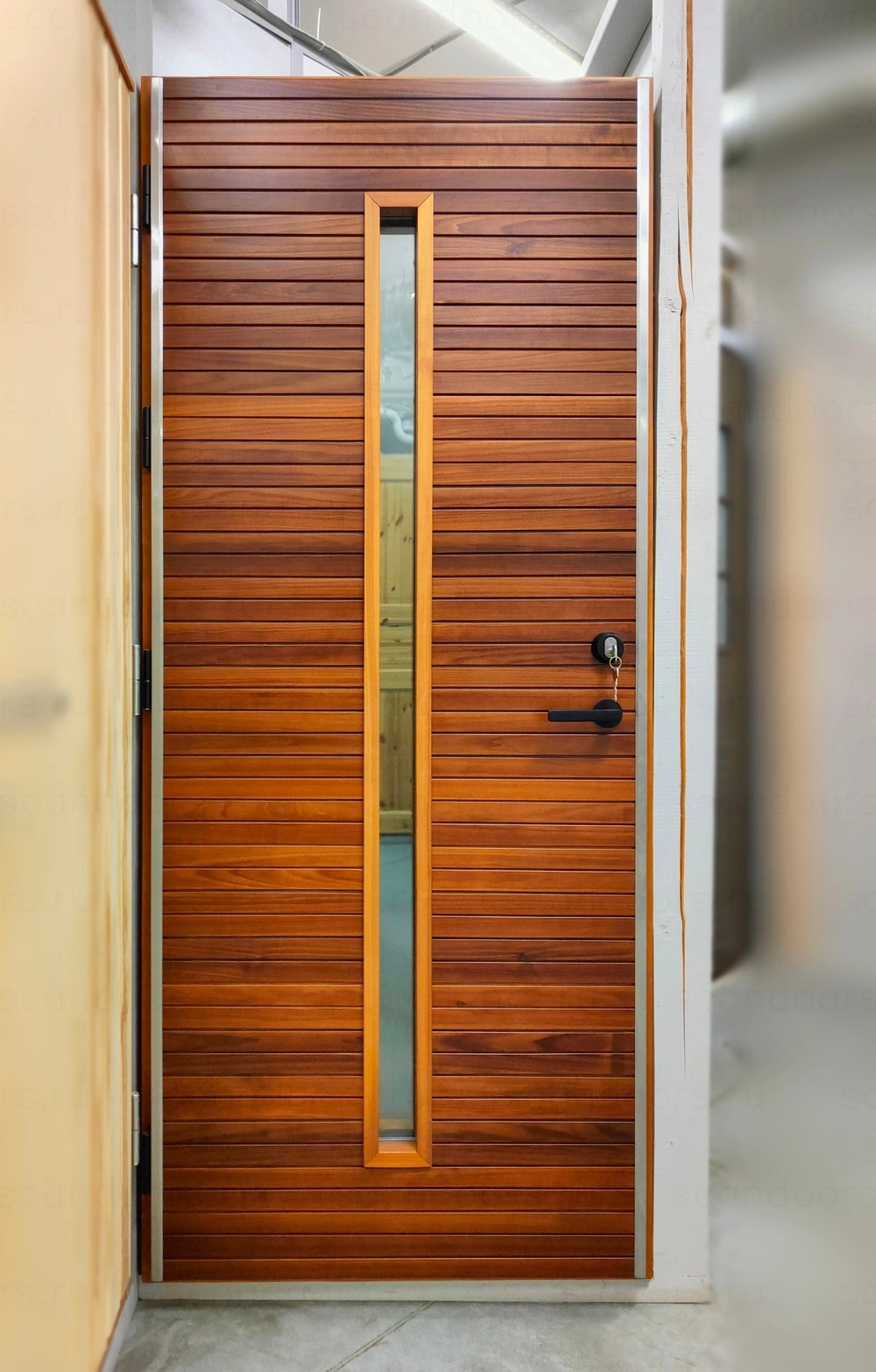 Фото 7 - Морозостойкая дверь Scandoors Planken Thermo. Отделка из термоосины, противоотжимной замок Assa 310 Scandoors: производство и монтаж
