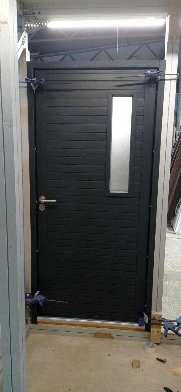 Фото 2 - Теплые двери с наружным притвором и отделкой из массива Scandoors Planken в исполнении Thermo Scandoors: производство и монтаж